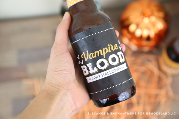 Free Printable Halloween Party Bottle Labels - four different designs for use on wine, beer, pop/soda bottles and more. An easy DIY way make your Halloween party a little more festive! Designs by Elegance and Enchantment for Remodelaholic.